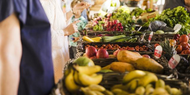 People Buying Vegetable Stall Market