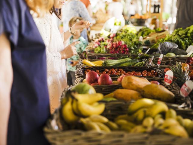 People Buying Vegetable Stall Market